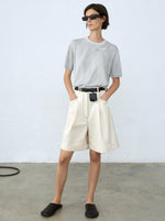 Load image into Gallery viewer, PLEATED BERMUDA SHORTS | NATURAL

